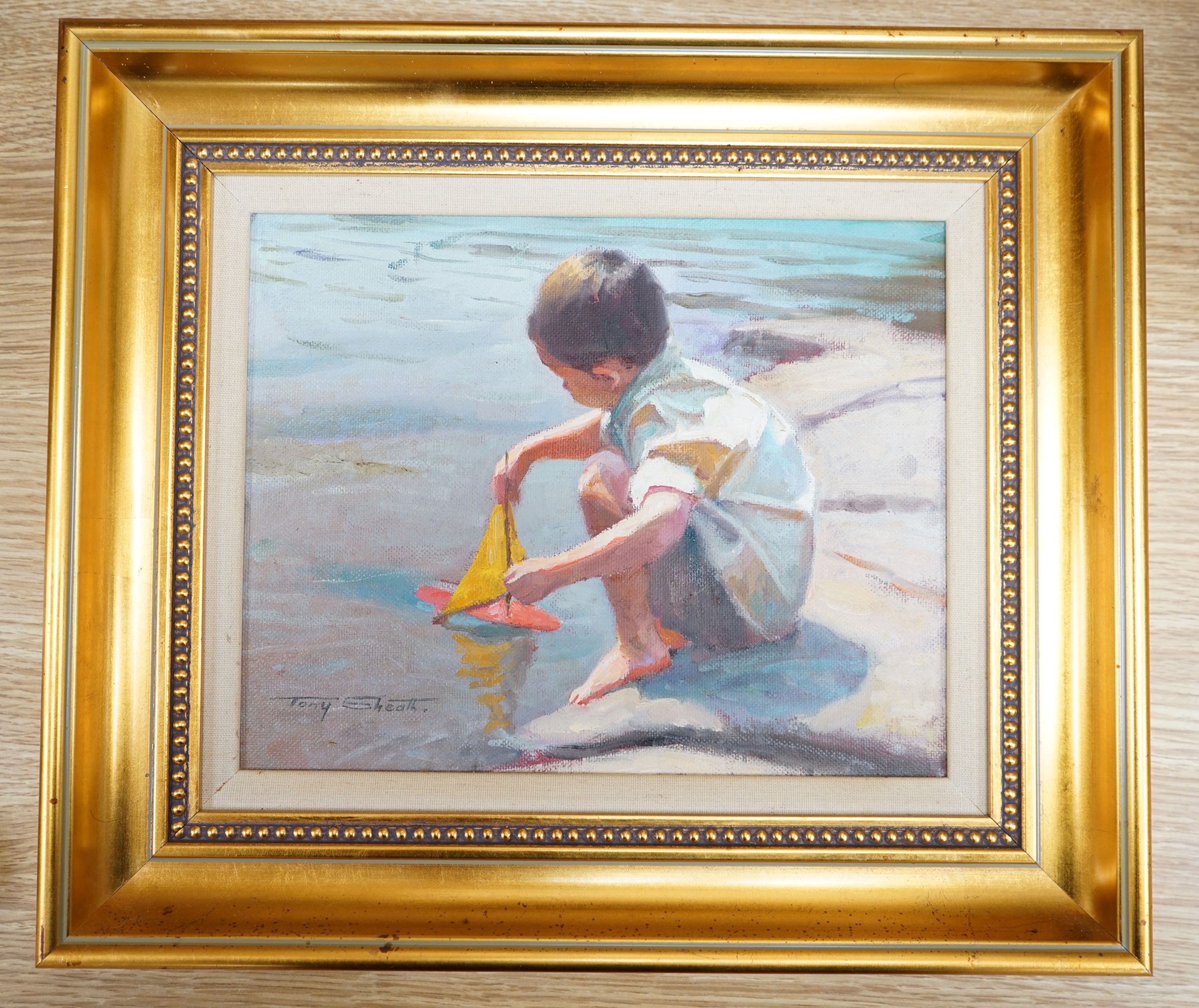 Tony Sheath (b.1946), oil on board, Boy with a toy sailing boat, signed, 20 x 25cm